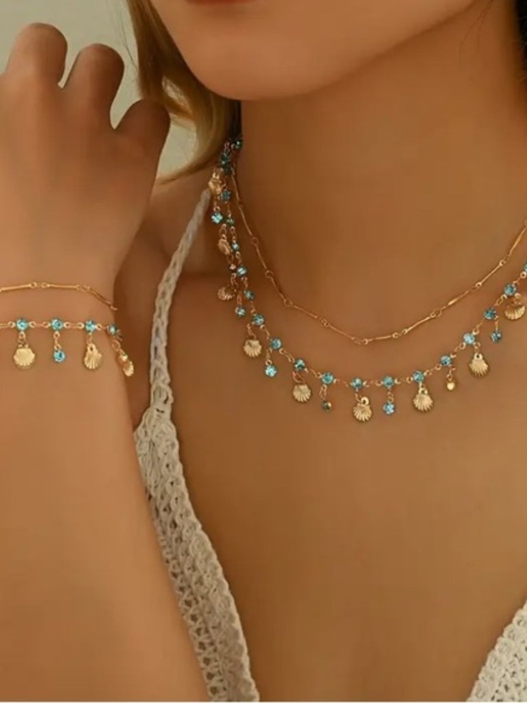 Blue Crystal & Shell Gold Toned Necklace & Bracelet Set